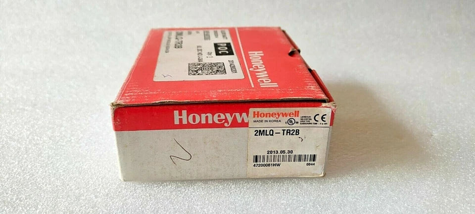 Honeywell 2MLQ‑TR2B emitting LED indicators in MasterLogic‑200 rack